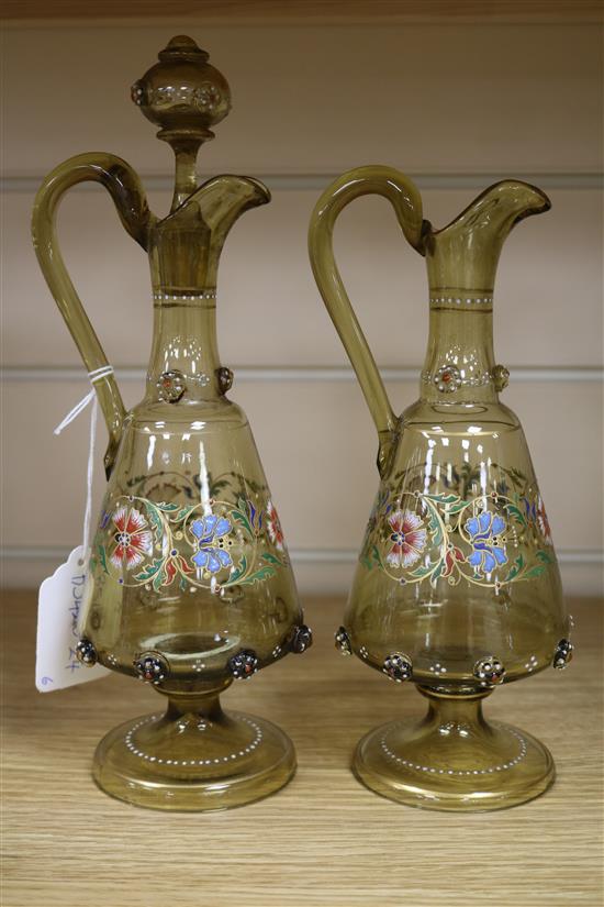 Two Bohemian enamelled glass liqueur jugs and four hock style liqueurs ewer 26cm